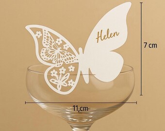 Tarjeta de mesa Mariposa Perla Blanca: Detalle de corazón de cristal para decorar la mesa de bodas.