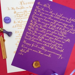 May include: A purple paper sheet and a white paper sheet featuring gold calligraphy text, accompanied by a purple wax seal stamp, a small purple wax seal with the name KAY, a gold wax stick, and a gold wax seal on the purple paper.