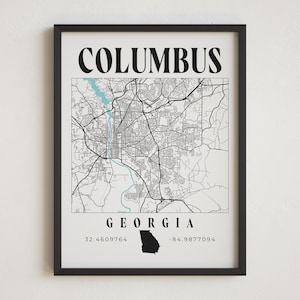 May include: Black and white map print of Columbus, Georgia with the city name and state name in bold black text. The coordinates 32.4609764 and -84.9877094 are listed below the state name.