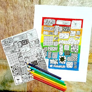 May include: A black and white coloring page with a rainbow pattern of geometric shapes. The page is partially colored with rainbow colored pencils.