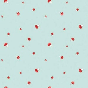 May include: A light blue fabric with a repeating pattern of red mushrooms. The fabric is perfect for quilting, crafts, and home decor projects.
