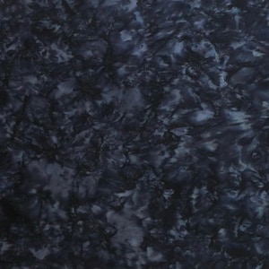 May include: A dark blue fabric with a marbled pattern. The fabric has a tie-dye effect with shades of blue and gray.