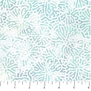 May include: A white fabric with a blue and green coral reef pattern. The pattern is a repeating design of coral branches.