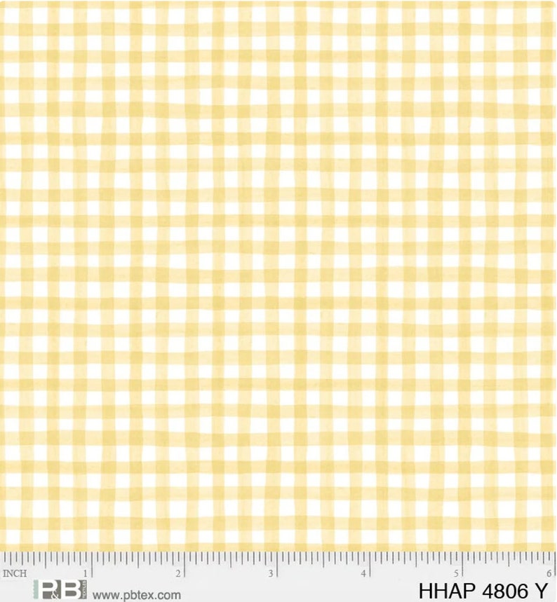 May include: A fabric with a yellow and white gingham pattern. The pattern consists of evenly spaced squares, creating a classic checkered design. The fabric has a soft, watercolor-like appearance. The bottom of the image includes a ruler with inch measurements.