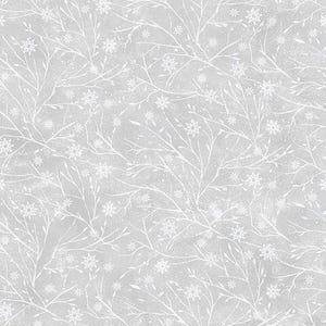 May include: A repeating pattern of white branches and snowflakes on a pale grey backdrop. The design has a watercolour effect, with delicate details and a winter theme. The branches are intertwined, creating a natural, organic feel.