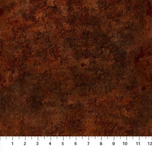 May include: A close-up of a rusty brown textured surface. The surface has a rough, uneven texture with a mottled appearance.