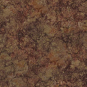 Peut inclure: Un motif sans couture avec un design abstrait brun et or. Le motif présente un fond texturé et marbré avec de petites formes rondes.