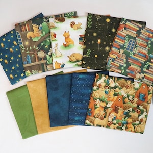May include: A collection of fabric pieces with various patterns. Designs include woodland animals reading books, starry night skies, and solid colors. The fabrics are arranged on a white surface, showcasing a variety of colors and textures.