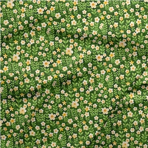 May include: A fabric with a dense floral pattern. The design features small, white and yellow flowers with green leaves and stems against a dark green background. The pattern is repeated across the fabric.