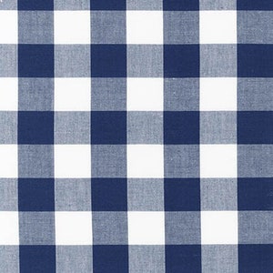 May include: A white and navy blue gingham fabric with a checkered pattern.