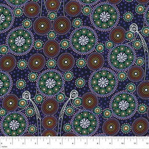 May include: A dark blue fabric featuring a repeating pattern of colourful, dotted circles and floral-like designs. The circles are in shades of brown, green, yellow, and pink, with white outlines. White line drawings of figures are also present.