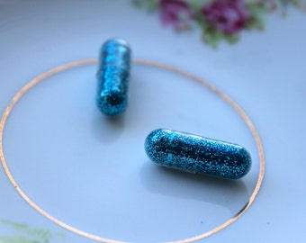 Glitter Pills in Peacock Blues