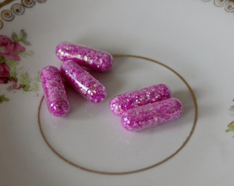 Glitter Pills in Cosmopolitan