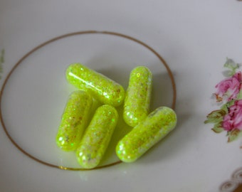 Glitter Pills in Delicious Yellow Chemical Sludge
