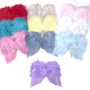 May include: Set of ten pairs of fluffy angel wings in various colors, including red, pink, blue, yellow, white, and purple. The wings are made of soft feathers and are perfect for adding a touch of whimsy to any costume or craft project.