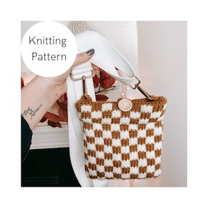 May include: A brown and white checkered knitted bag with a white strap and a wooden button. Knitting Pattern.