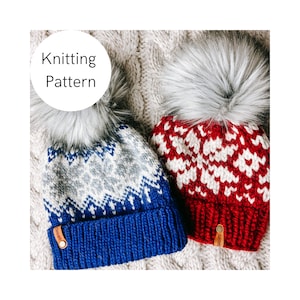 May include: Two knitted winter hats with faux fur pom poms. One hat is blue with a white and gray geometric pattern, the other is red with a white geometric pattern.