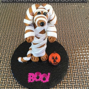 The mummy  Doxie/Dachshund Halloween figurine