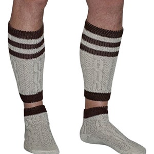 May include: A pair of white socks with brown stripes. The socks are made of a soft, comfortable material and are perfect for everyday wear.