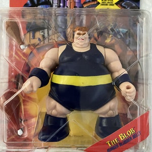May include: A blue and yellow action figure of The Blob from the X-Force comic book series. The figure has a rubber belly and comes with a trading card.