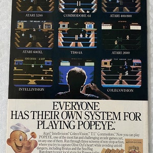 May include: A vintage advertisement for the Popeye video game, featuring screenshots of the game on different gaming consoles, including Atari, Intellivision, ColecoVision, T.I., Commodore, and Atari 2600. The ad features the iconic Popeye cartoon character and the text "Everyone has their own system for playing Popeye."