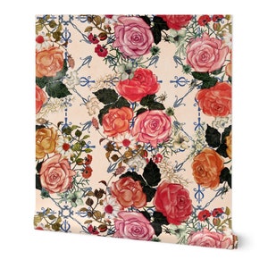 May include: A seamless pattern featuring pink, red, and orange roses with green leaves and stems on a cream background. The roses are arranged in a repeating pattern with a blue and white geometric design in the background.