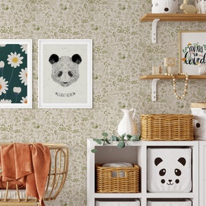 Olive green boho flower wallpaper in a baby's nursery