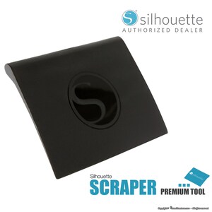 May include: Black Silhouette scraper tool with the Silhouette logo. The tool is designed to help remove excess vinyl or other materials from a cutting mat.