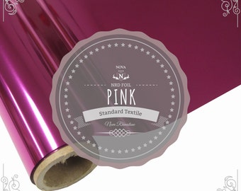 May include: A roll of pink metallic foil with a label that reads "NOVA NRD FOIL PINK Standard Textile Nova Rhinestone".