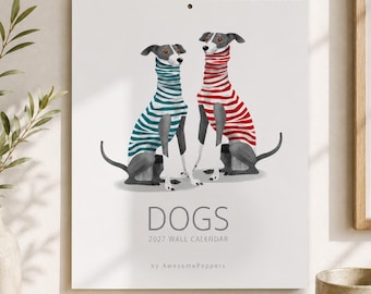May include: A 2027 wall calendar featuring an illustration of two greyhounds wearing striped sweaters. One dog wears a teal and white striped sweater, while the other wears a red and white striped sweater. The text reads DOGS 2027 WALL CALENDAR by AwesomePeppers.