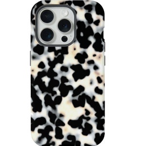May include: Black and white abstract phone case with a mottled pattern. The case has a raised camera bump with a black trim.