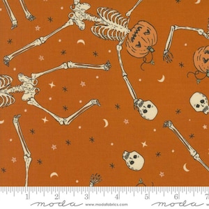 May include: Orange fabric with a Halloween theme. The fabric features a repeating pattern of white skeletons, jack-o'-lanterns, stars, and crescent moons. The skeletons are in various poses, and the jack-o'-lanterns have carved faces.