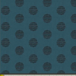May include: Teal fabric with a repeating pattern of black polka dots. Each dot is made up of thin, horizontal lines. A ruler is visible at the bottom of the image.
