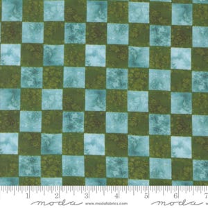 May include: A green and blue checkered fabric with a subtle watercolour effect. The fabric is made of 100% cotton and is perfect for quilting, crafts, and home decor.