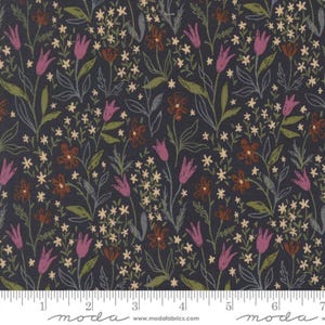 May include: Dark navy fabric with a floral pattern. The design features stylized flowers in shades of purple, brown, and cream, with green and gray leaves and stems. The fabric is marked with a ruler and the word "moda".