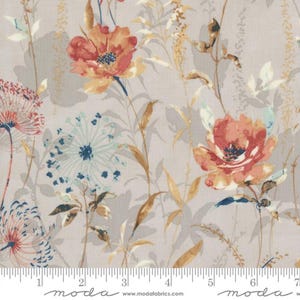 May include: A grey fabric with a floral pattern featuring pink, orange, and blue flowers. The fabric has a subtle texture and a repeating pattern. The fabric is marked with a ruler in inches.