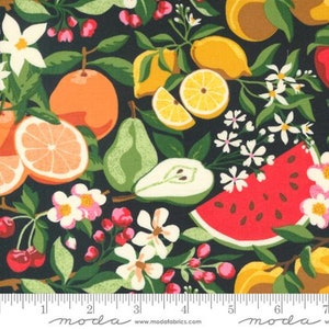 May include: Dark fabric with a vibrant fruit and floral pattern. The design includes oranges, lemons, pears, watermelon, cherries, and white flowers. A ruler is visible along the bottom edge of the fabric.