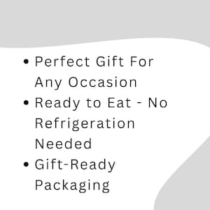 May include: A white graphic with black text listing three bullet points: Perfect Gift For Any Occasion, Ready to Eat - No Refrigeration Needed, and Gift-Ready Packaging. The background features a curved gray shape at the top and bottom corners.