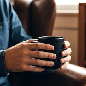 man drinking coffee
