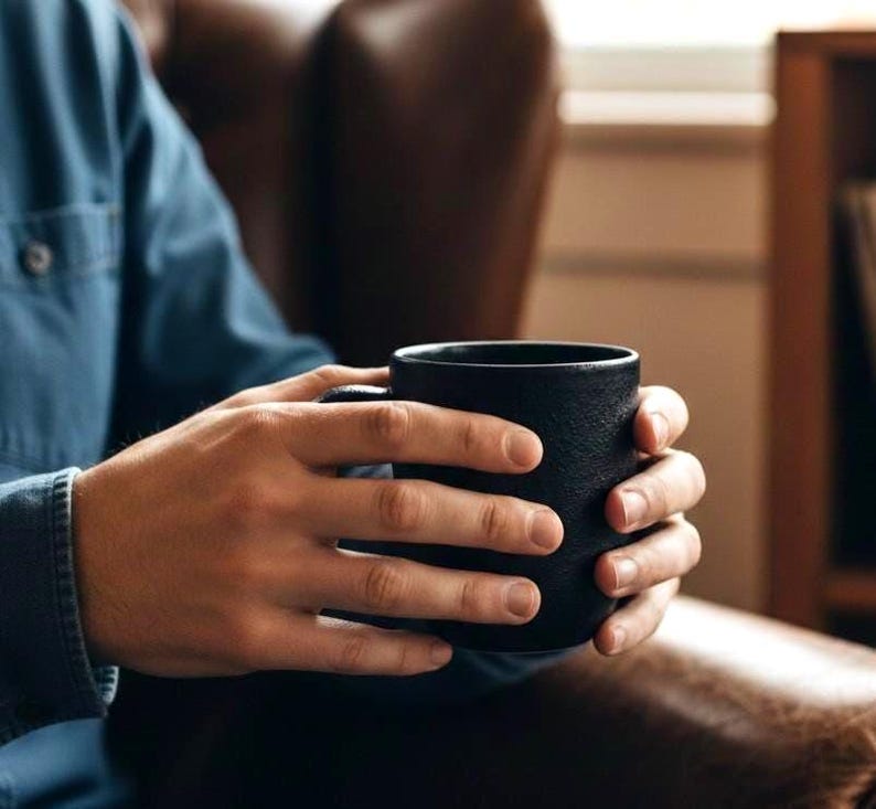 man drinking coffee