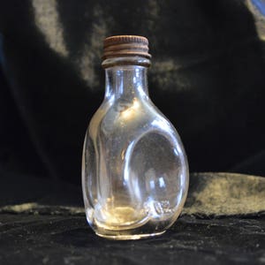 Vintage 2oz Medicine Bottle image 1