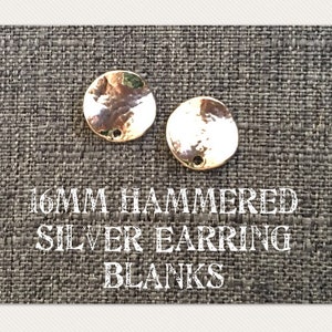 May include: Two 16mm silver hammered earring blanks. The blanks are round and have a hole in the center.