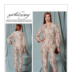 May include: A beige jumpsuit with a floral print and a matching belt. The jumpsuit has long sleeves with a button-up front and a V-neck. The model is wearing gold heels. Vogue Patterns American Designer Rachel Comey V1523.