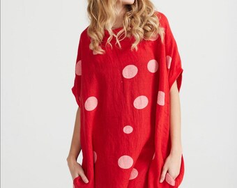 Red polka dot Rosabella dress that can be worn as a top . Linen polka dot top in red .