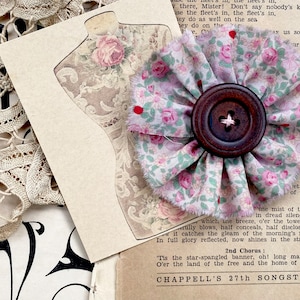 vintage fabric flower brooch made from old floral fabric . Flower brooch to add to clothing, slow stitching projects, journal covers.