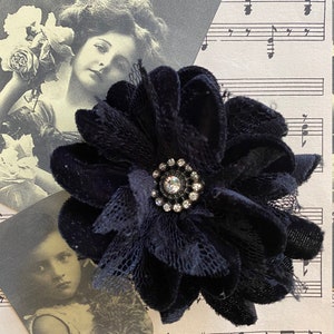 Black velvet and lace flower brooch with sparkly button center. Vintage black velvet flower and button brooch.