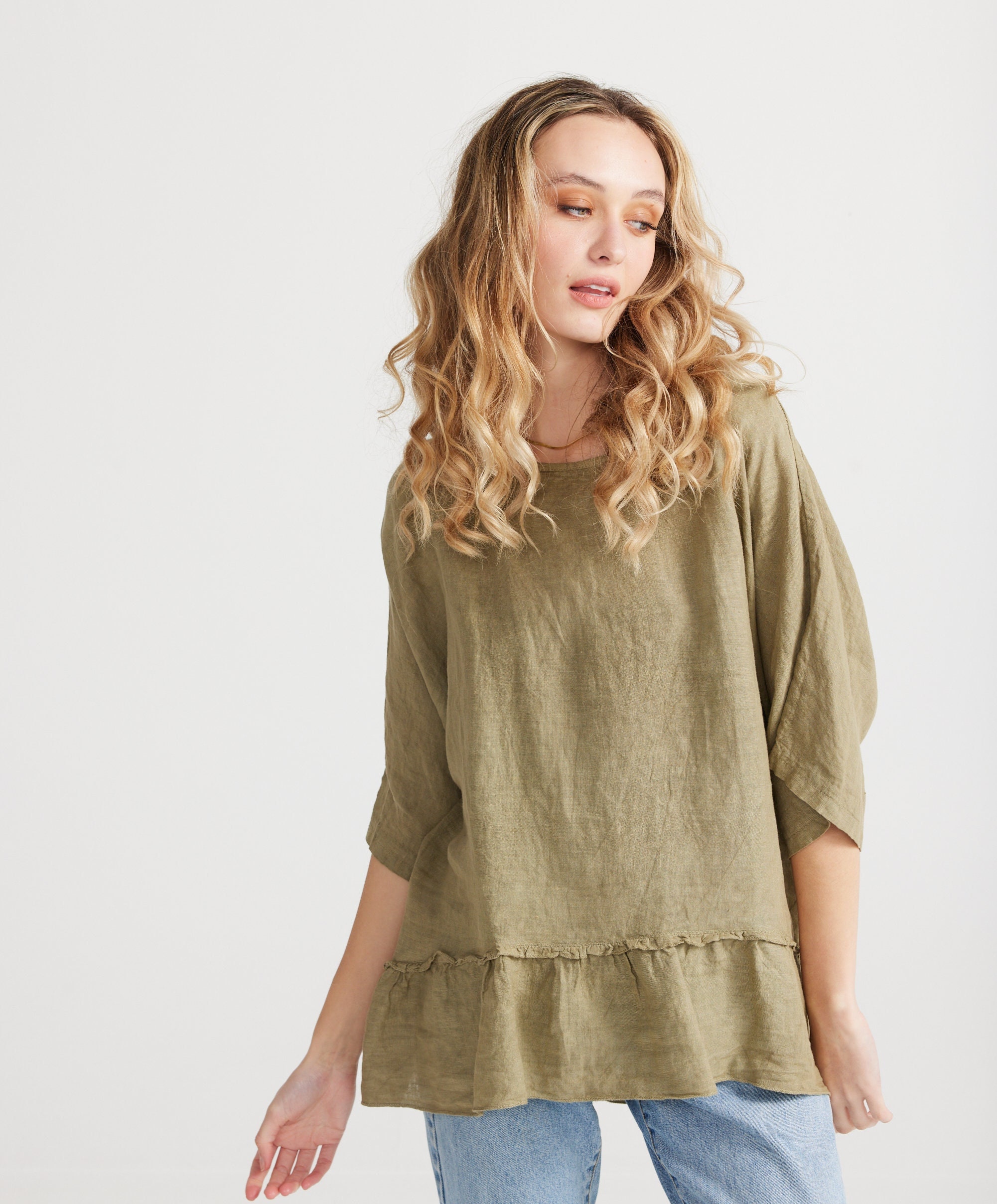 Priscilla linen top with ruffled detail. Linen blouse with pretty ruffle in Olive Green.