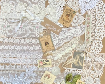 Mixed media treasure pack of vintage and new cotton laces, embellishmnents, buttons, ribbons and ephemera.