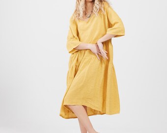 Linen Stella dress in Buttercup. Casual pretty very full linen dress in Yellow.