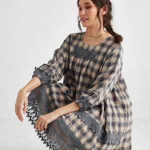 Isla plaid dress. Gorgeous tartan dress in either Grey or Black plaid with Vintage lace detail.